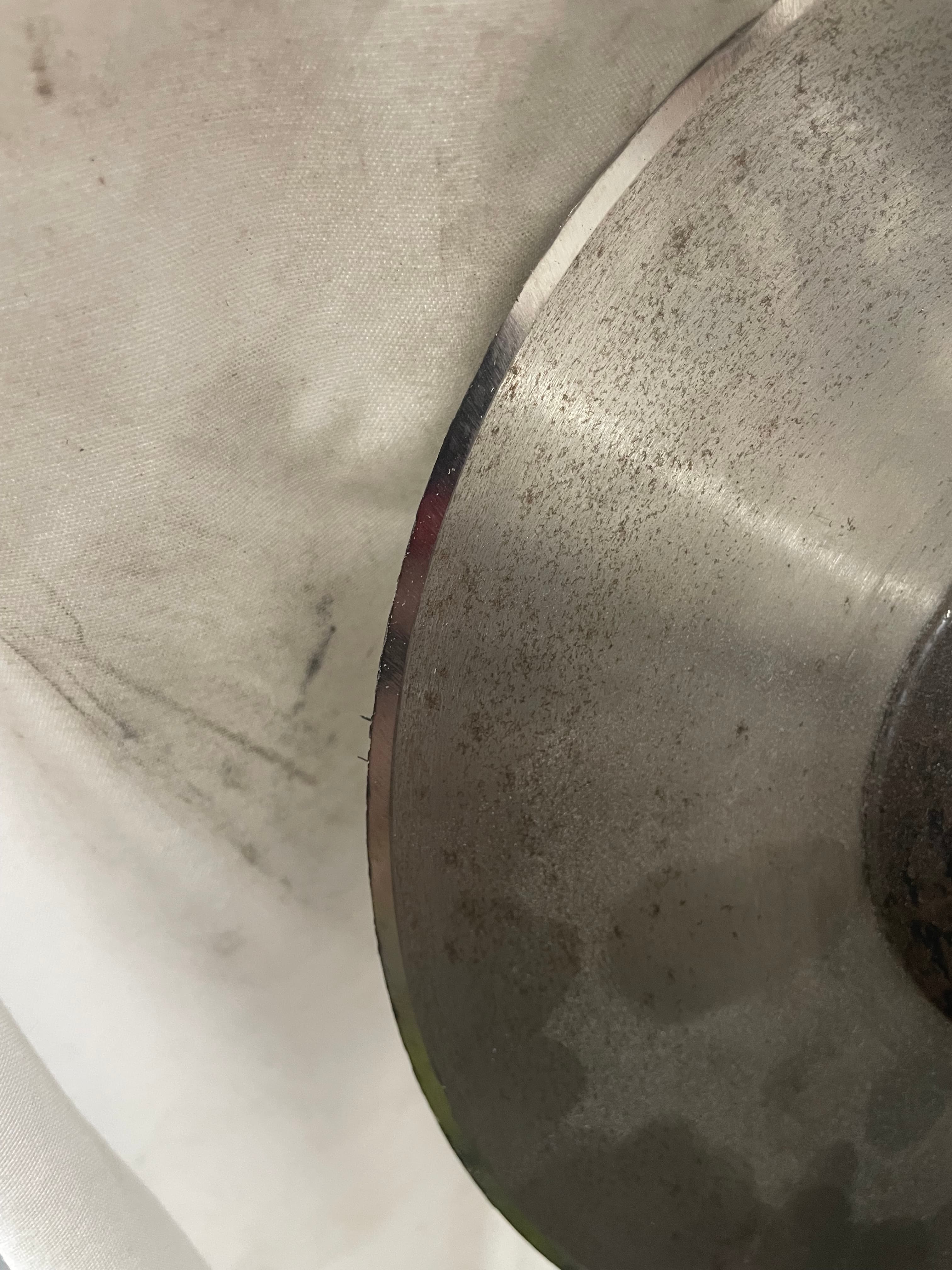 Modified shear shaft fitted to bench grinder as a sharpening jig